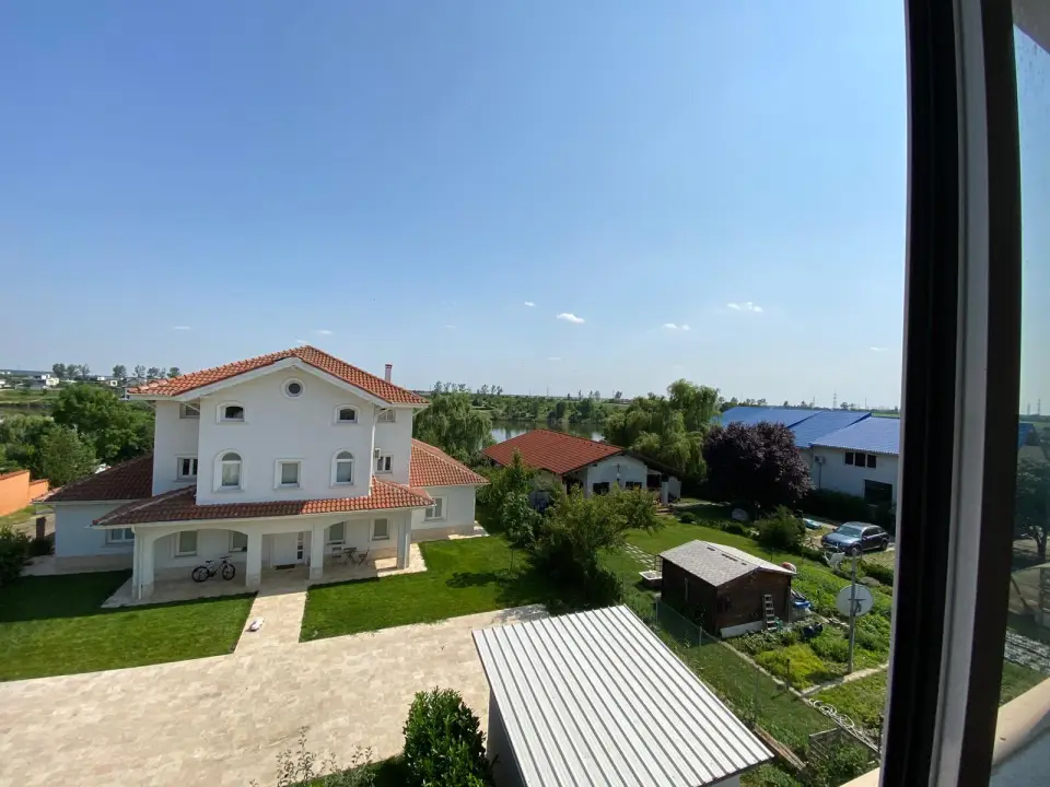 casa de vânzare în Moara Vlăsiei, Ilfov - spațiu generos cu vederi spre lac - imaginea 12